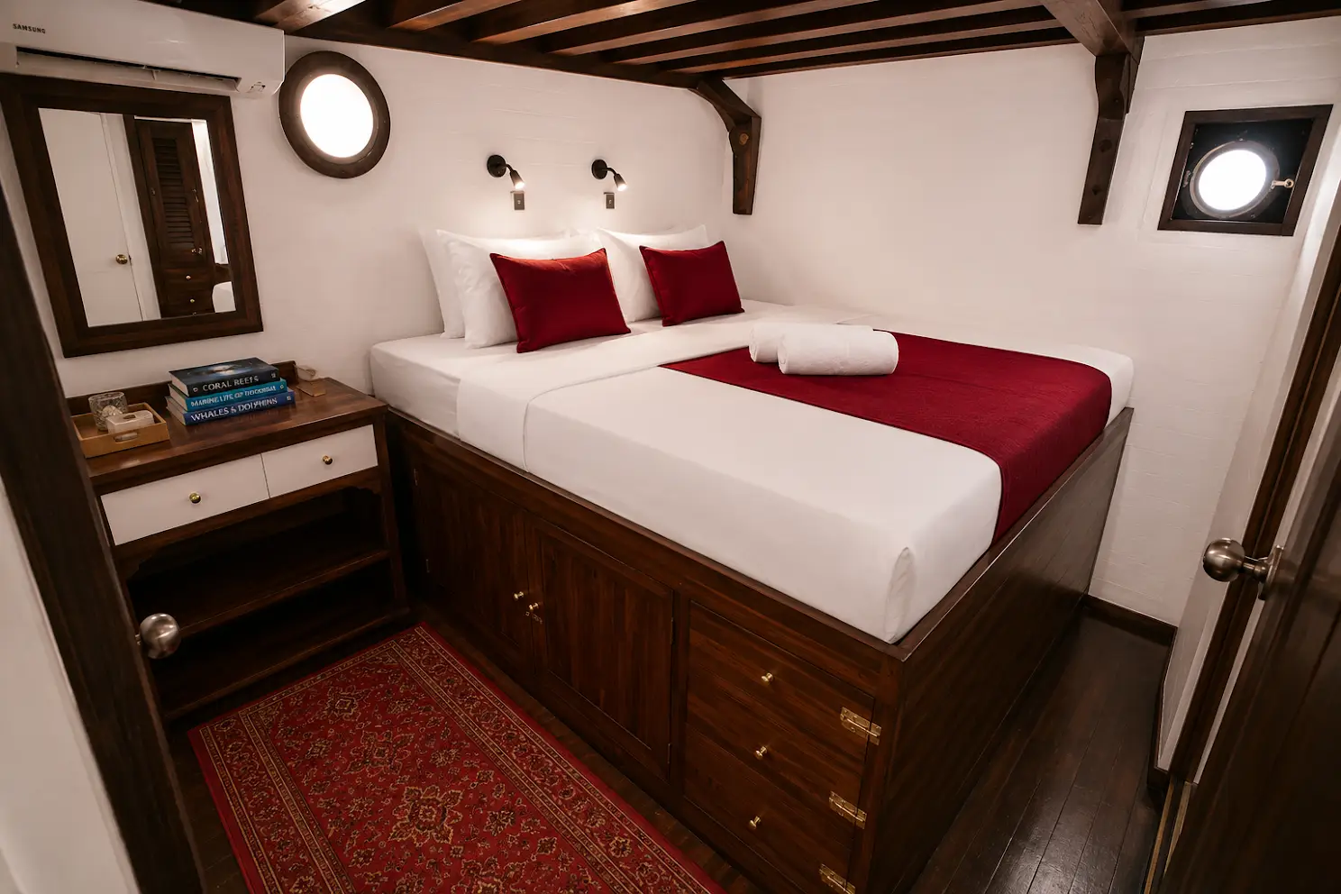Cabin 5 & 6 twin state room with two beds and portholes on Seven Seas Liveaboard | Komodo Luxury