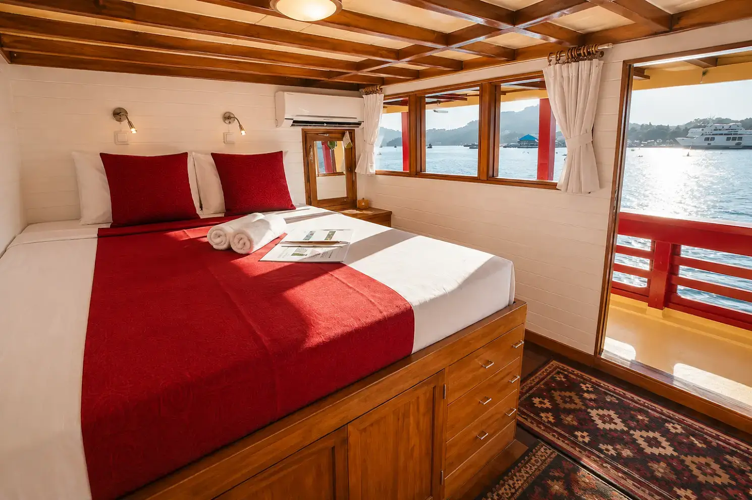 Cabin 7 & 9 double state room with sea view windows and deck access on Seven Seas Liveaboard | Komodo Luxury