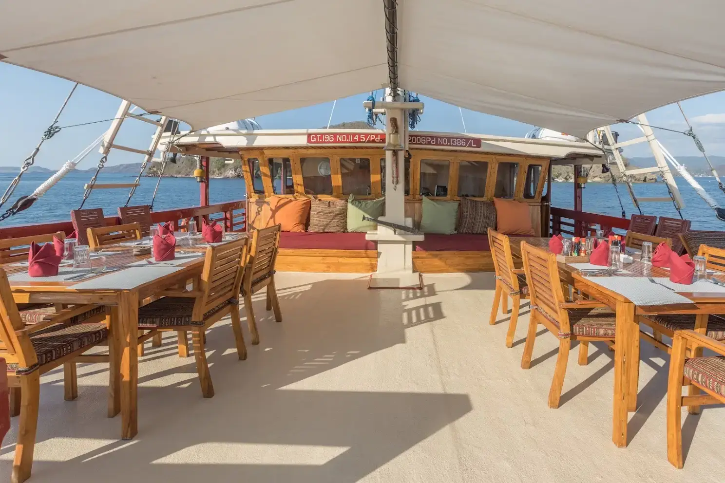 Shaded outdoor dining and chill deck on Seven Seas Liveaboard | Komodo Luxury